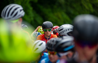 A young rider on the start line waiting for a race to begin