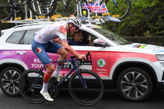Stuart Blunt driving a team car at the 2022 UCI World Road Championships in Australia