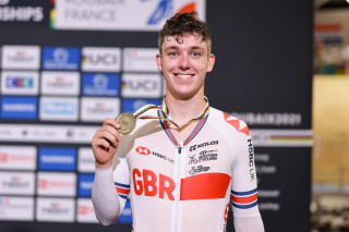 Picture by Alex Whitehead/SWpix.com - 21/10/2021 - Cycling - Tissot 2021 UCI Track Cycling World Championships - Menâ€™s Scratch Race - Stab Velodrome, Roubaix, France - Rhys Britton of Great Britain (Bronze) on the Menâ€™s Scratch Race podium