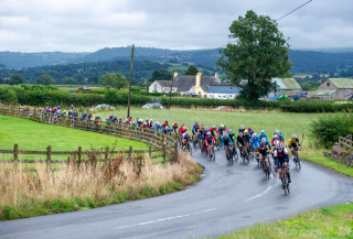 Group of riders approaching a corner at Cadence Road Race round of the Junior Menâ€™s National Road Series.