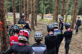 Regional Gravity Talent Development Centre in Rushmere Park, junior talent in the forest looking at lines.