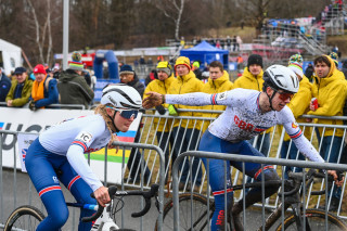 Corran Carrick-Anderson and Cat Ferguson team relay handover