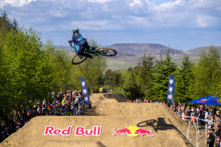 Gravity rider Billy Pugh mid-air at an event