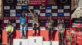 Podium shot from the first round of the first downhill round of the World Cup in Losinj Croatia, Rachel Atherton, Myriam Nicole, Tahnee Seagrave