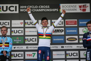 Tom Pidcock on the podium after winning the 2019 UCI Cyclo-Cross World Championships men's U23 category.