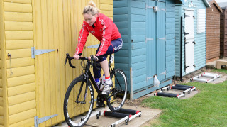 Ciara Horne warming up on the rollers during the 2014 Friends Life Women's Tour. Image: SWPIX/Alex Broadway.