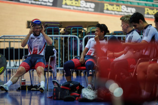 Cavendish shares a joke with his teammates ahead of their effort on the track.