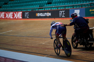 The revelation of the London Olympics, Philip Hindes gets a helping hand from sprint coach Justin Grace.