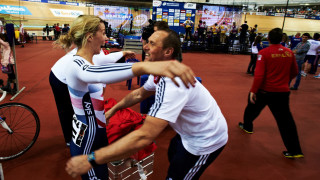 Great Britain Cycling Team soigneur Luc de Wilde celebrates with Becky James in 2013
