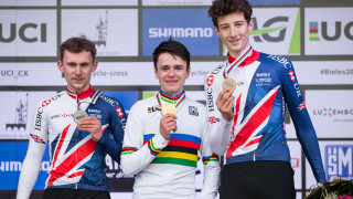 Great Britain Cycling Team's Tom Pidcock, Dan Tulett and Ben Turner celebrate a British one-two-three in the junior men's race at the 2017 UCI Cyclo-cross World Championships