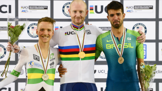 Great Britain Cycling Team's Jon Gildea receives his C4-5 scratch gold medal at the UCI Para-cycling Track World Championships