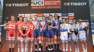 Ed Clancy, Steven Burke, Ollie Wood and Kian Emadi celebrate winning team pursuit gold at the Tissot UCI Track Cycling World Cup