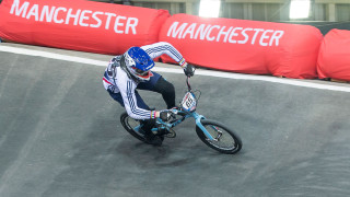 Liam Phillips on his way to a fourth consecutive win in Manchester at the UCI BMX Supercross World Cup