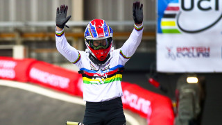 Liam Phillips celebrates winning the UCI BMX Supercross World Cup round in Manchester - while wearing his world champion rainbow stripes