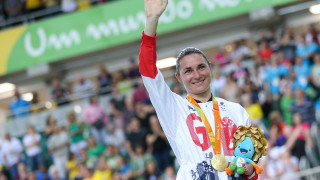 Dame Sarah Storey on the podium after winning gold at the 2012 London Olympic Games.
