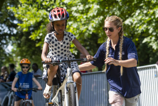 Laura Kenny at Let's Ride Manchster 2018 having her picture taken with taken.