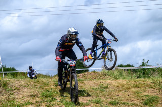 National 4X Series riders in mid jump at rounds three and four at Redhill Extreme. 