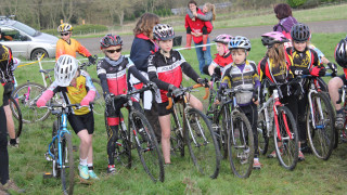 Children cycling at a cyclo-cross session