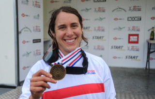 Katy Curd with winners medal at the 2018 HSBC UK | National Downhill Championships.