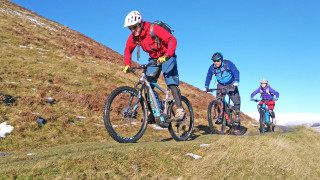 Rider using an eMTB 