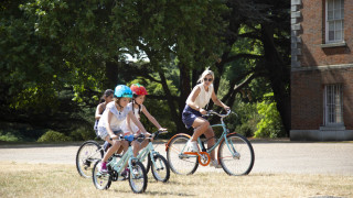 Helen Skelton riding with children at a Ready Set Ride event in Osterley Park in London.