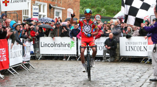 Peter Kennaugh celebrates solo victory at the 2013 Lincoln Grand Prix.