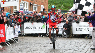 Peter Kennaugh celebrates solo victory at the 2013 Lincoln Grand Prix.