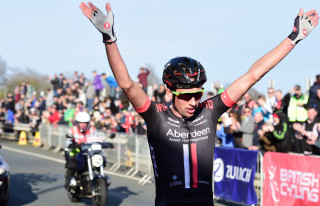 Ian Bibby celebrates victory at the 2016 Manx Grand Prix