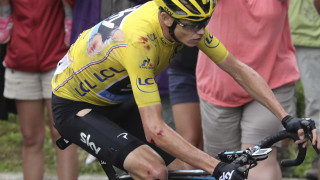 Chris Froome crashed in treacherous conditions but recovered to keep his grip on the yellow jersey.