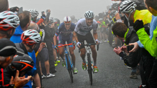 Riders struggle up a climb on stage 2
