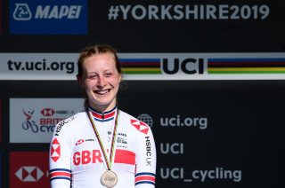 Elynor Backstedt on the podium after winning bronze at the 2019 UCI Road World Championships in Yorkshire.