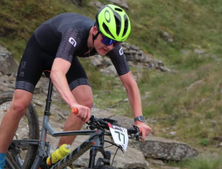 Ethan Grimshaw riding during a Crank It event