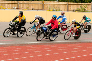 Corinne Hall (inside) battles for the lead with Janet Birkmyre (in black) and Jayne Paine