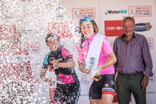 Mike Hodgson, organiser of the Tour of the Reservoir on the podium alongside Sophie Wright.