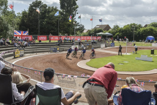 Crowds at a cycle speedway event.