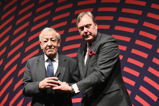 Jon Miles is presented with a Gold Badge of Honour at the 2023 British Cycling Awards in Manchester
